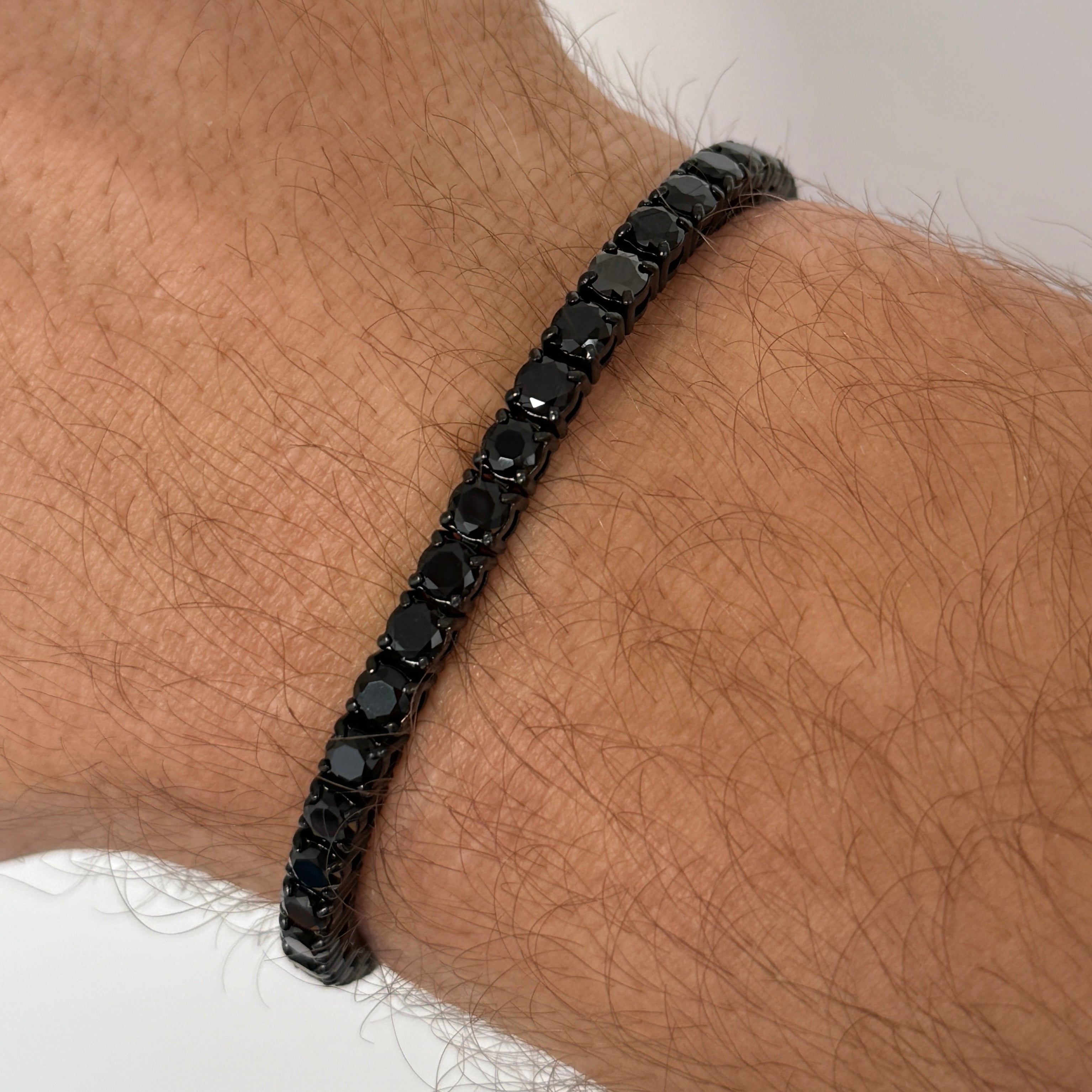 Tennis bracelet all black 4mm in stainless steel. With black cubic zirconia stones. Like black diamonds. Black PVD Coating