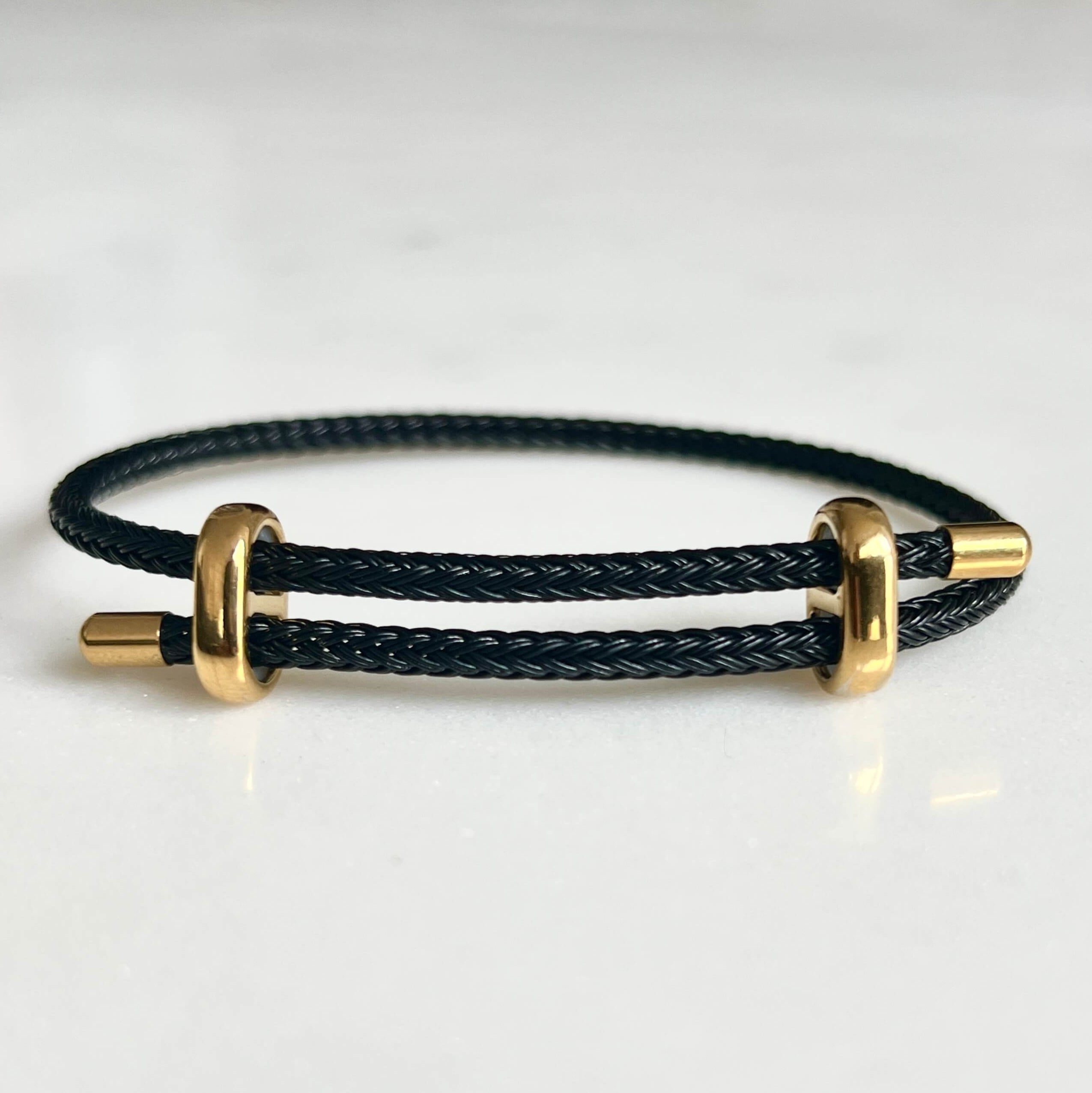 Woven steel rope bracelet gold black | Emils Jewellery Online Shop