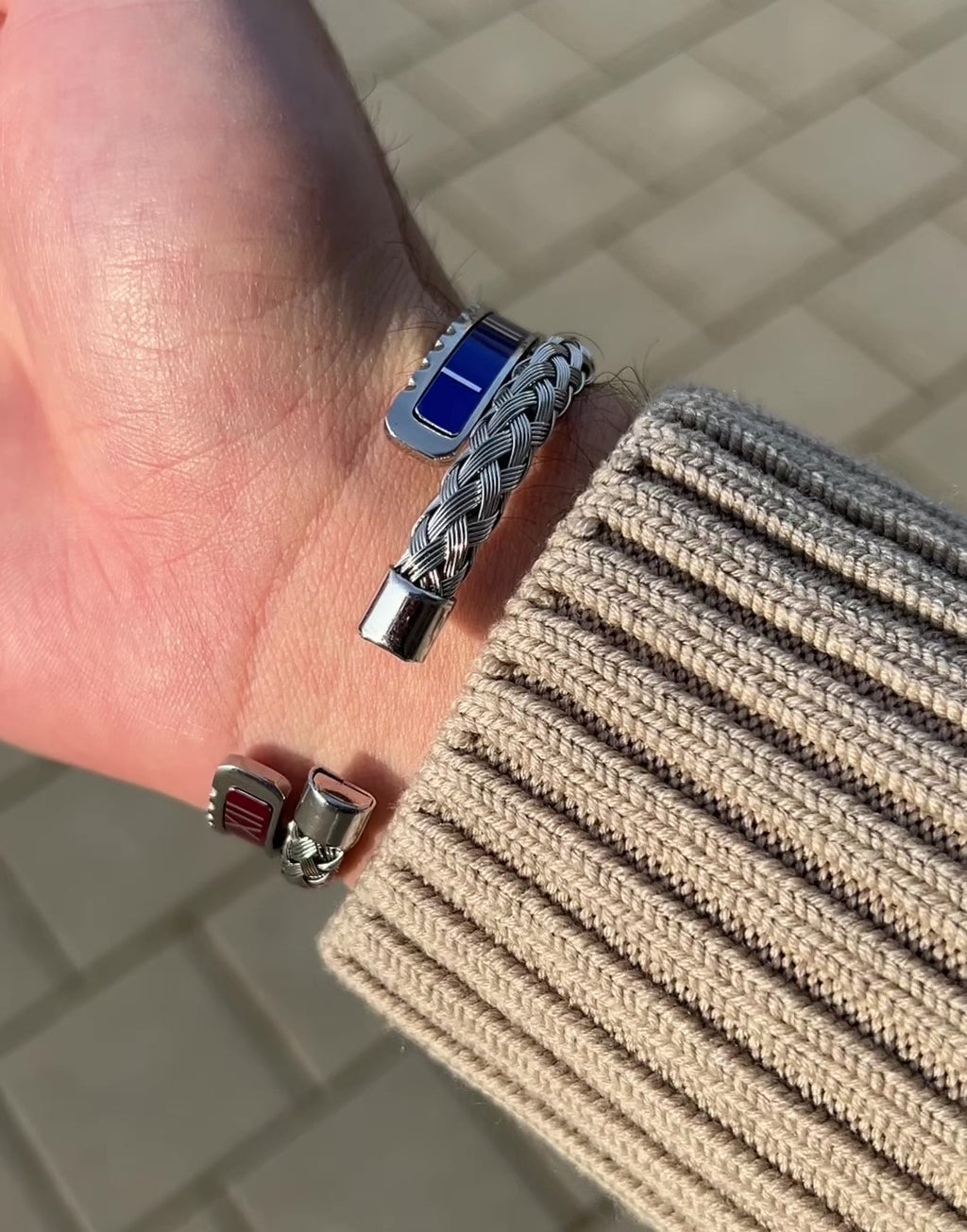 Video showing the Roman Speed bracelet silver red and blue bezel style bracelet - Emils Jewellery 